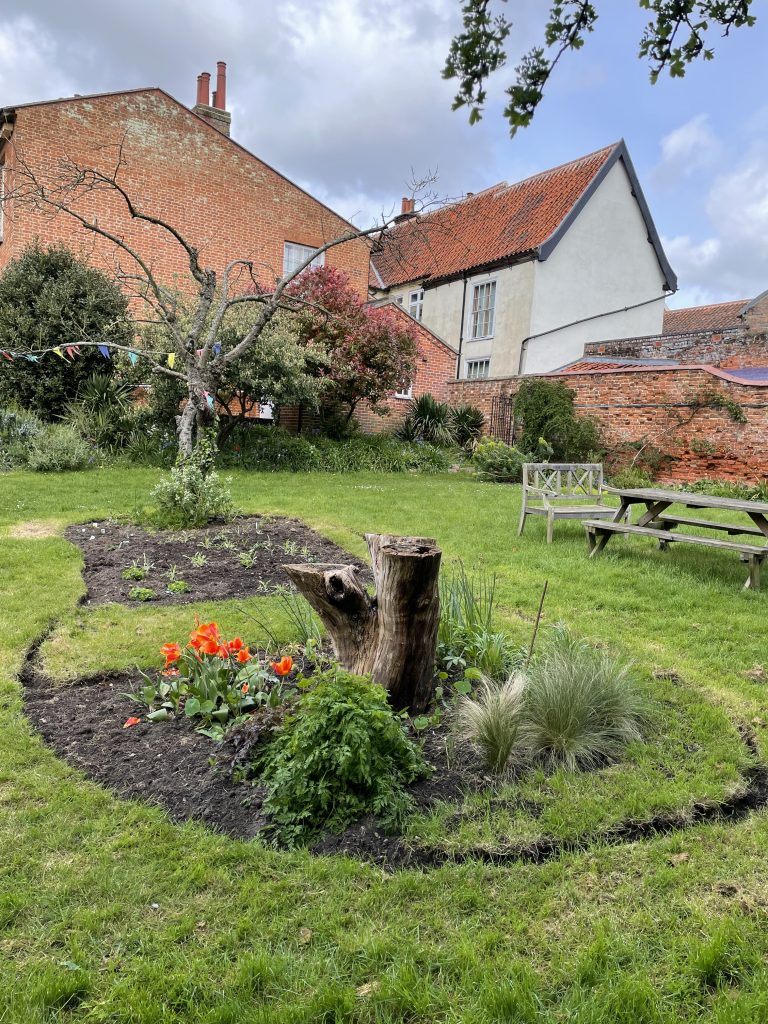 Flowerbed designed to attract pollinators