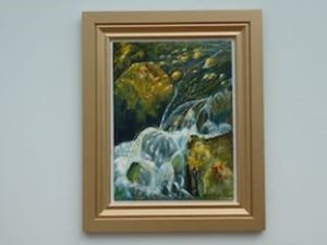 Painting of water falling over rocks