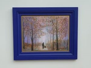 Painting of man and dog in trees