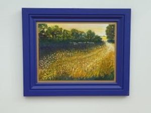 Painting of meadow at sunset